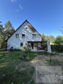 Gartenansicht Vollvermietetes Doppelhaus in gepflegter Wohnanlage in Senzig-Waldesruh