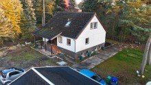 Blick mit Garten Wohnen �ber dem See: Charmantes Einfamilienhaus mit gro�em GS in idyllischer Hanglage von Teupitz